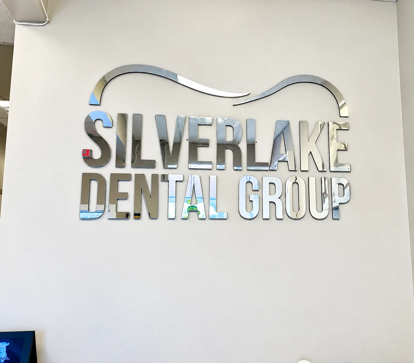 Silverlake Dental Group logo on the office wall